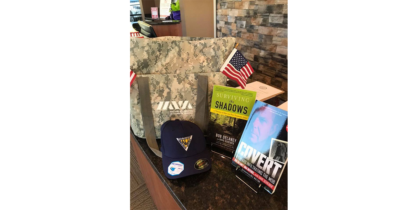 Military books and items on reception desk