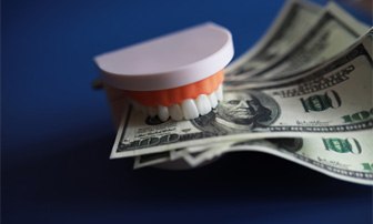 dentures biting dollars cost of dentures in Greensboro
