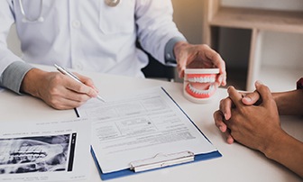 patient at a dental implant consultation