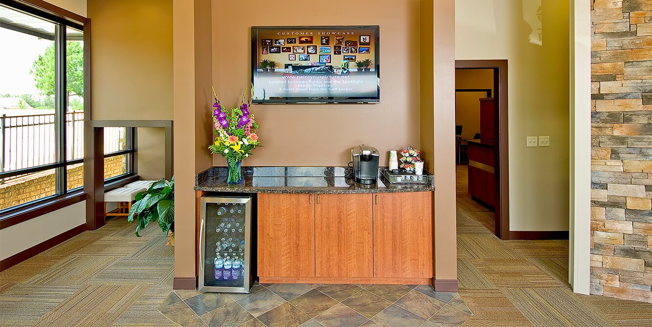 Complimentary beverage bar in dental office waiting room