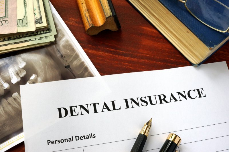 Dental insurance paperwork on desk