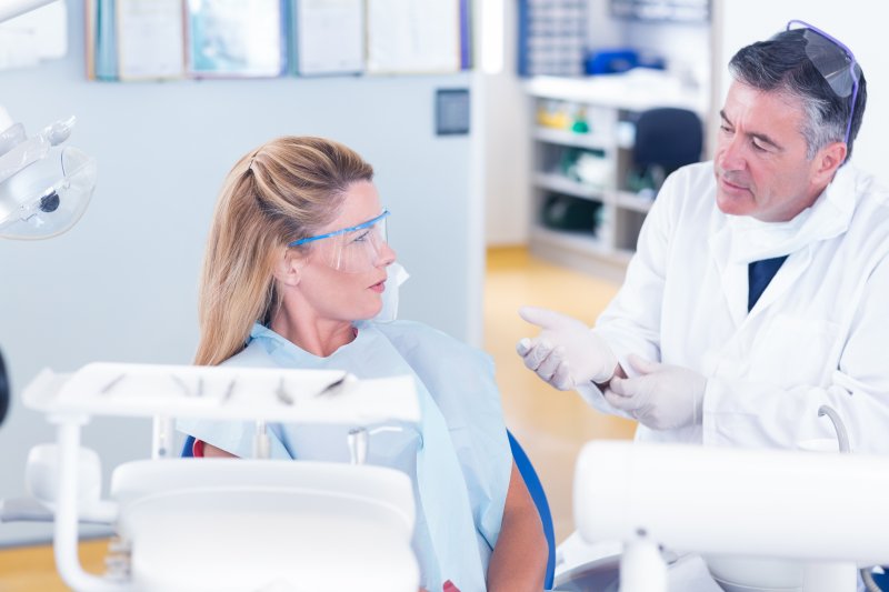 patient undergoing dental implant consultation in Greensboro